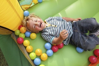 boy in ball pit