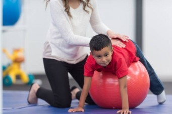 boy on  a ball